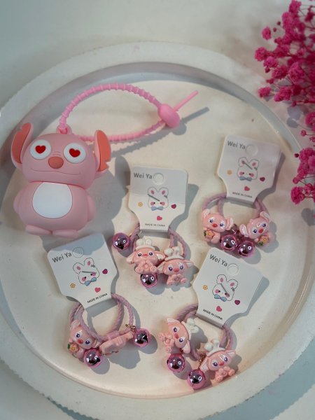 مغيط شعر لابوبو جرس \سعر الكرت (15) عدد قطع 10 